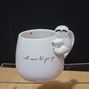 Sloth Hanging on Cup w/writing "I Will Never Let You Go"